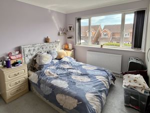 Bedroom One- click for photo gallery